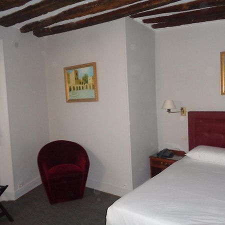 Hotel Les Degres De Notre Dame ปารีส ภายนอก รูปภาพ