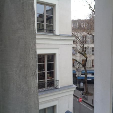 Hotel Les Degres De Notre Dame ปารีส ภายนอก รูปภาพ