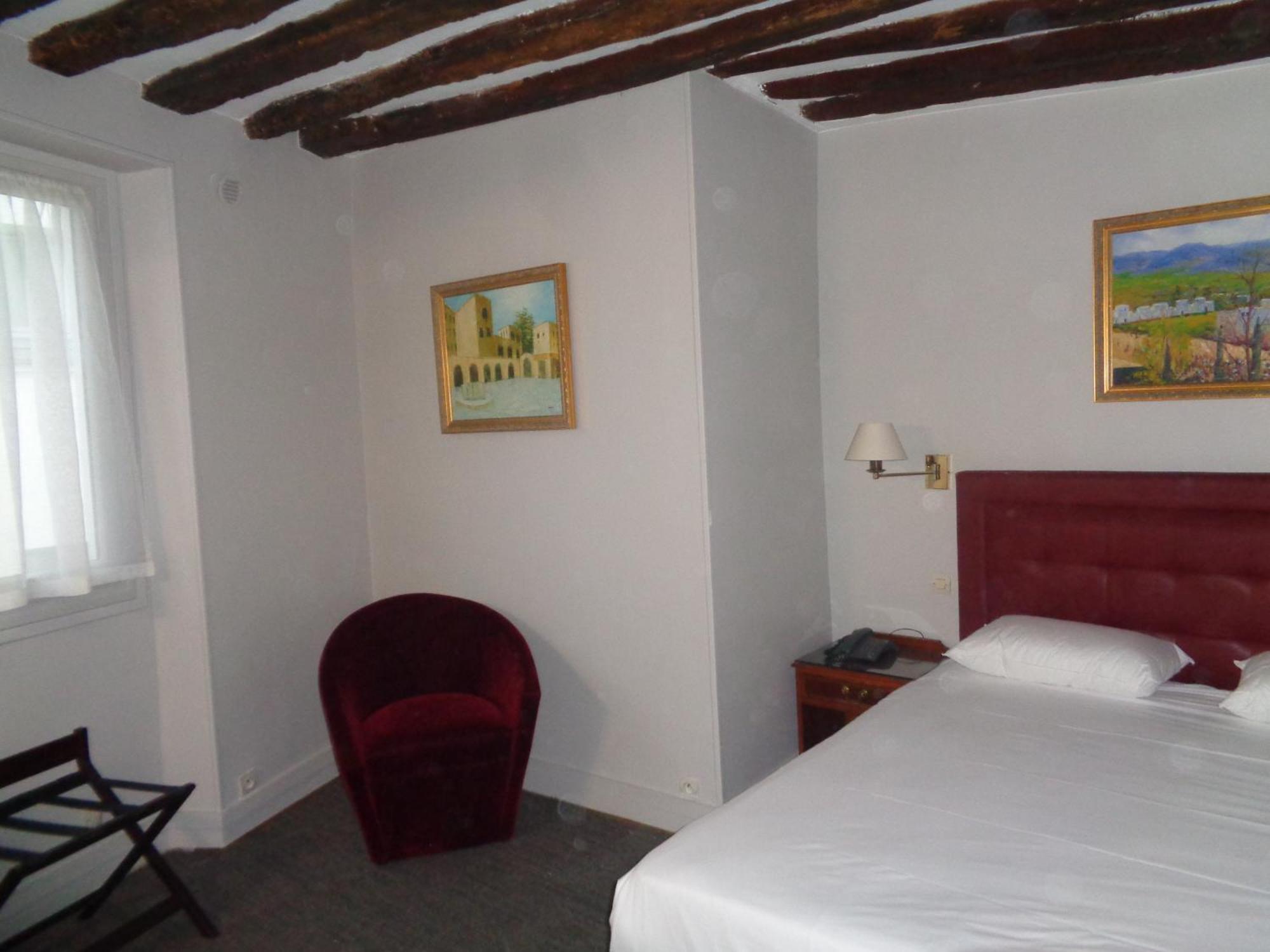 Hotel Les Degres De Notre Dame ปารีส ภายนอก รูปภาพ
