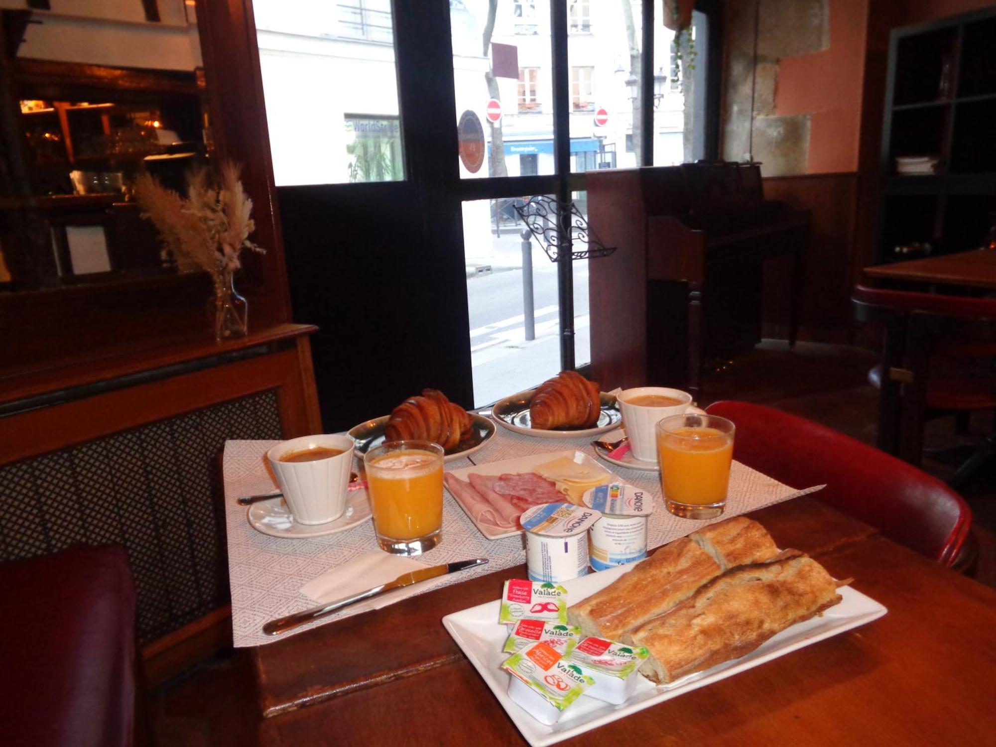 Hotel Les Degres De Notre Dame ปารีส ภายนอก รูปภาพ
