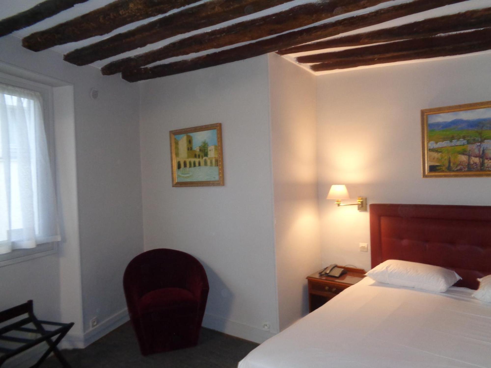 Hotel Les Degres De Notre Dame ปารีส ภายนอก รูปภาพ